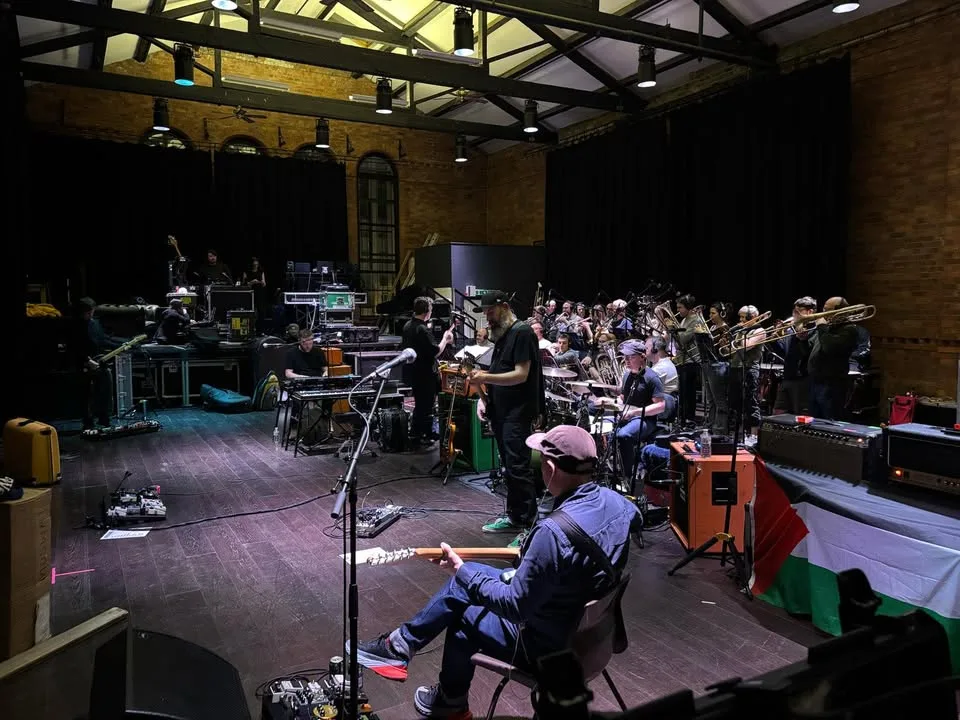 Mogwai and the KNDS Fairey Band rehearsing together before the BBC Radio 6 Music Festival